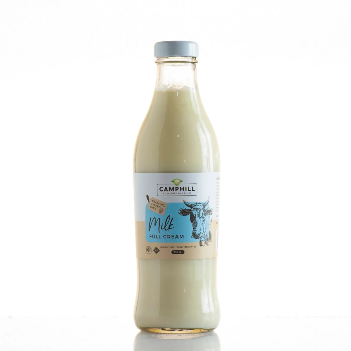 A 750 ml glass bottle of Camphill pasteurised full cream milk from grass-fed Jersey cows.