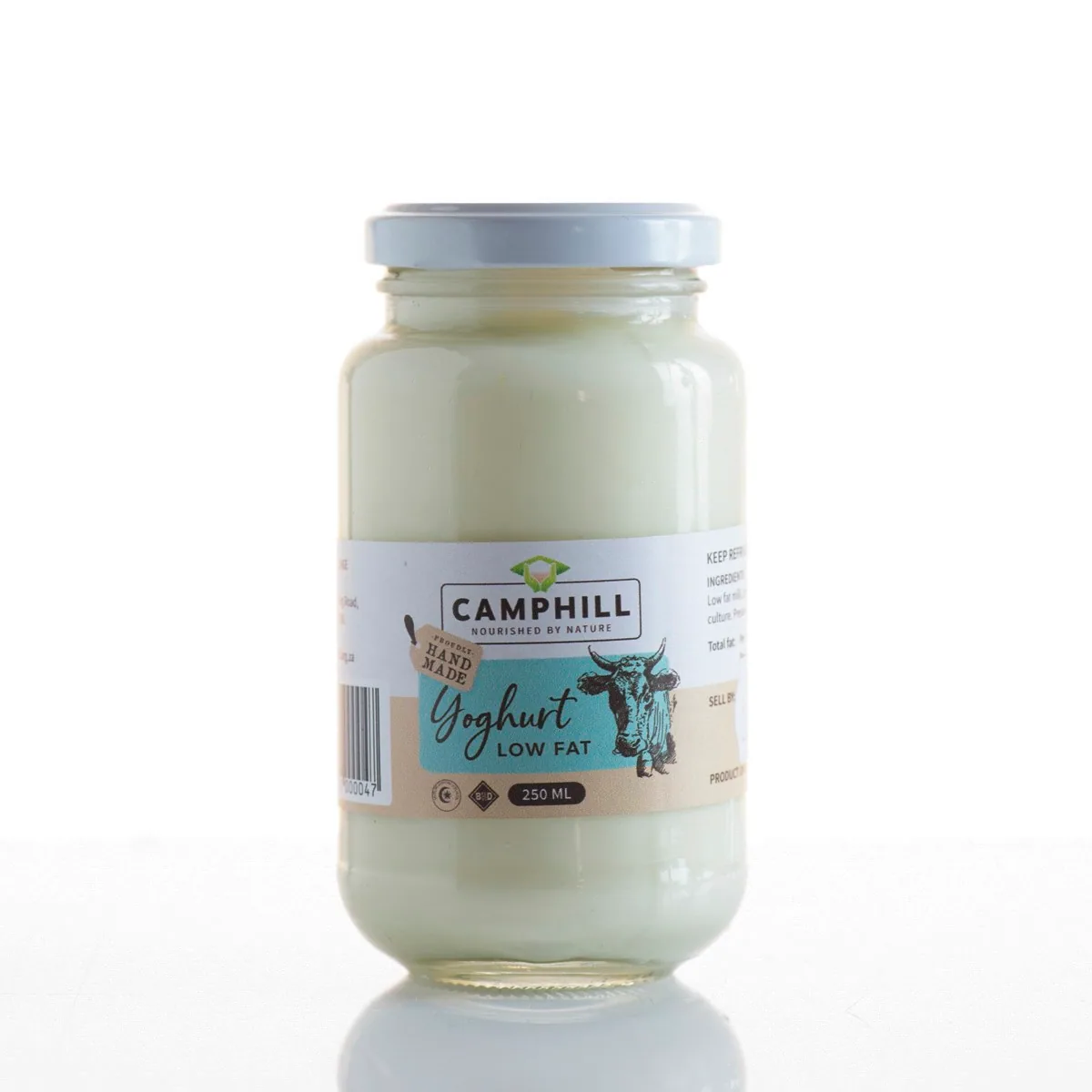 A 250 ml glass jar of Camphill low fat yoghurt, marked hand made and preservative free.
